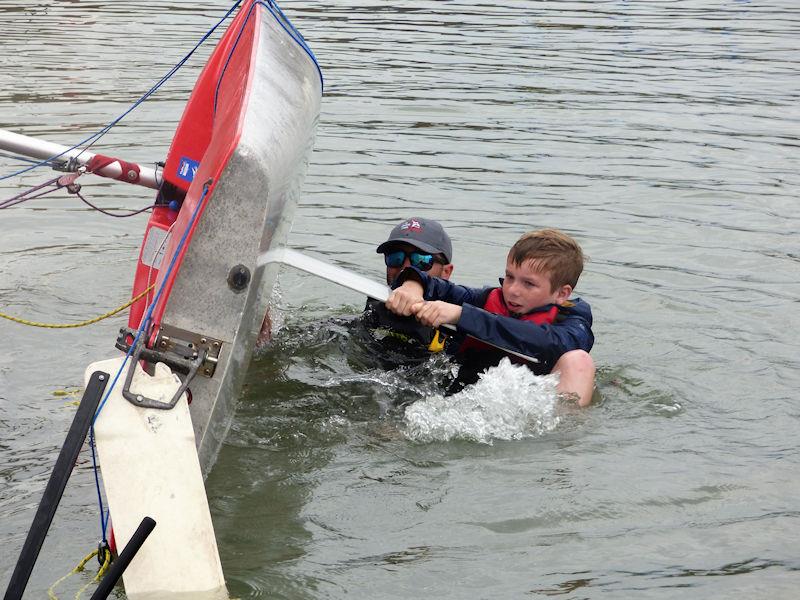 Capsize recovery under instruction during Solway Yacht Club Cadet Week 2022 photo copyright Becky Davison taken at Solway Yacht Club and featuring the Topper class