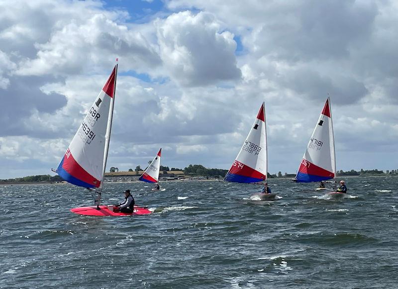 Downwind in breezy conditions during the ITCA (GBR) Invitatonal Training at Draycote Water photo copyright Martin Gunn taken at Draycote Water Sailing Club and featuring the Topper class
