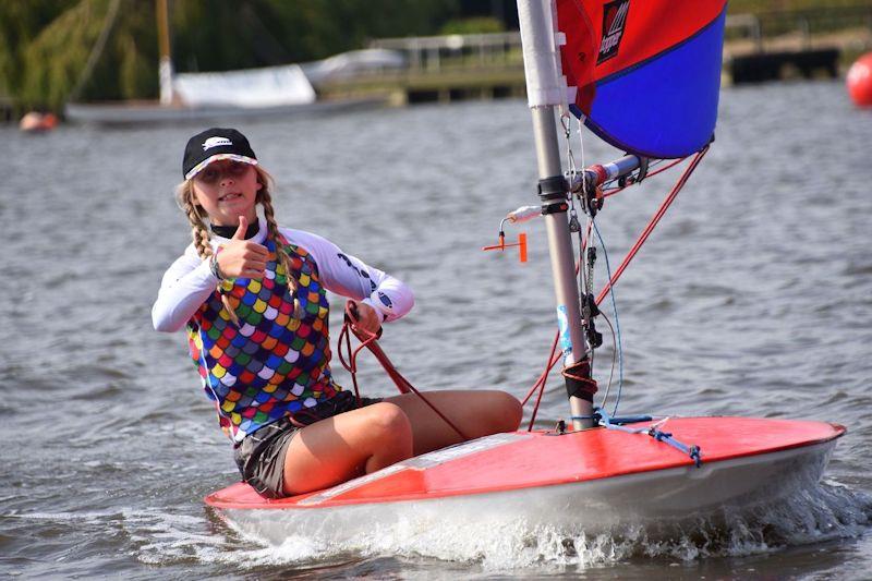 Thumbs up for a good result by Elly Thwaites of Snowflakes SC - 28th Broadland Youth Regatta photo copyright Trish Barnes taken at Waveney & Oulton Broad Yacht Club and featuring the Topper class