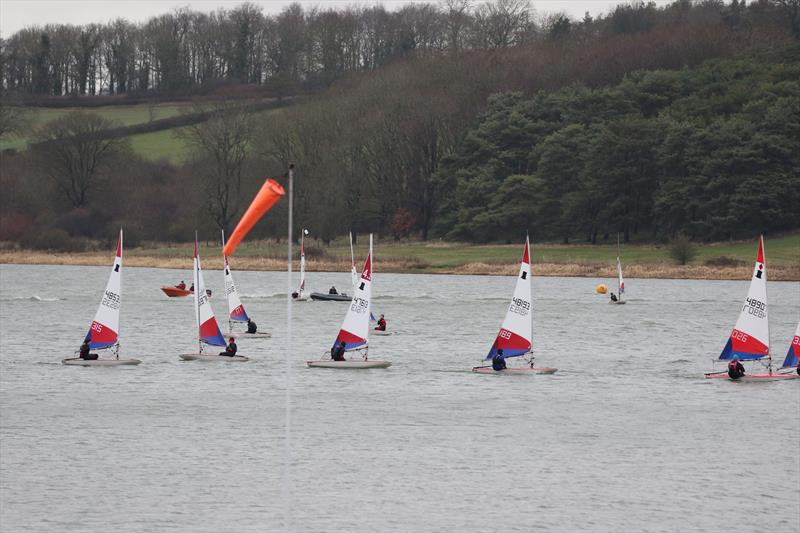 Negotiating the gusty conditions during Midlands 2022-2023 Topper Traveller Series Round 4 at Hollowell photo copyright Steven Angell taken at Hollowell Sailing Club and featuring the Topper class