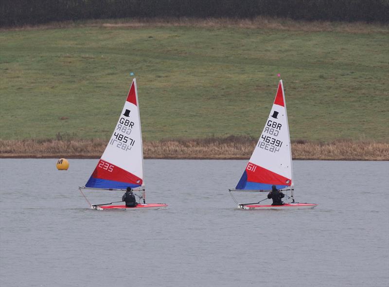 Close racing between Jessica Powell and Katherine Gunn during race 4 of Midlands 2022-2023 Topper Traveller Series Round 4 at Hollowell photo copyright Steven Angell taken at Hollowell Sailing Club and featuring the Topper class