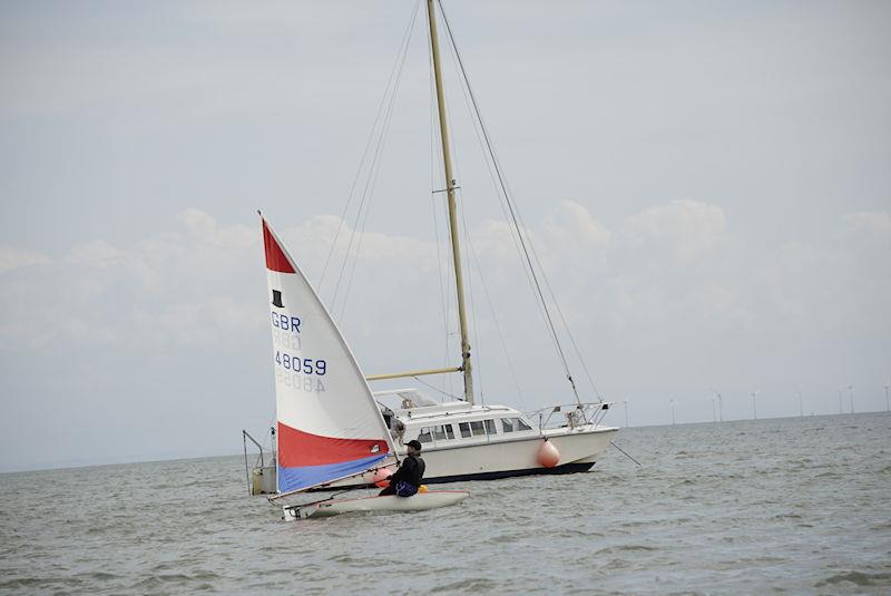 Solway YC Cadet Week - Lucy Leyshon passes the Committee Boat photo copyright Finlay Train taken at Solway Yacht Club and featuring the Topper class