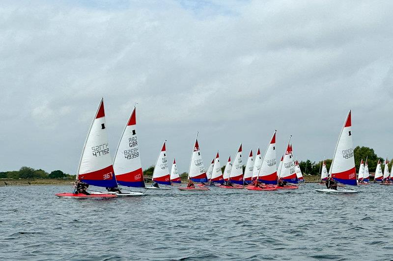 Fleet beating to windward - South East Topper series at Island Barn for the Tom Howard Trophy photo copyright Chloe Tollit taken at Island Barn Reservoir Sailing Club and featuring the Topper class