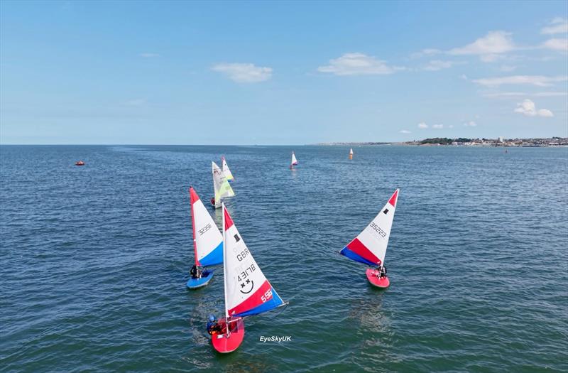 Topper battle downwind - Whitstable Week 2026 photo copyright Eye sky taken at Whitstable Yacht Club and featuring the Topper class