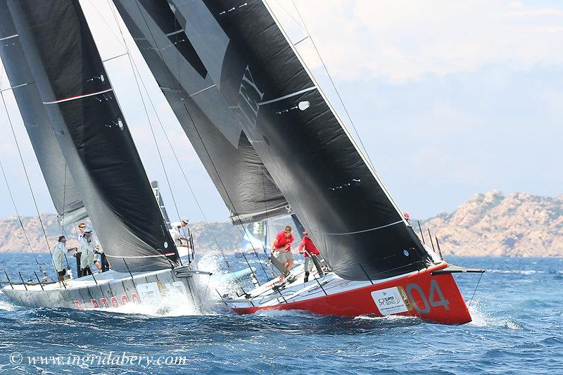 Gladiator (red hull) hits Platoon (silver) after a fast double tack in the 52 SUPER SERIES Settimana delle Bocche day 2 photo copyright Ingrid Abery / www.ingridabery.com taken at Yacht Club Costa Smeralda and featuring the TP52 class