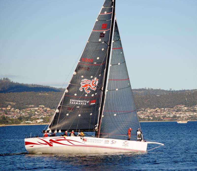 Cougar II powers down the Derwent in the Maria Island ocean race photo copyright Peter Campbell taken at Royal Yacht Club of Tasmania and featuring the TP52 class