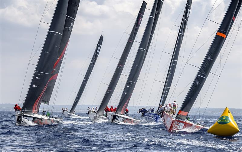 Provezza (Bow 09) and Phoenix 12 (Bow 12) seek to maintain a narrow leader over their pursuing rivals photo copyright Kurt Arrigo / Rolex taken at  and featuring the TP52 class