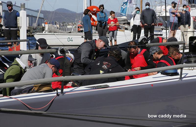The requisite RAT huddle aboard Ichi Ban! photo copyright Bow Caddy Media taken at Cruising Yacht Club of Australia and featuring the TP52 class