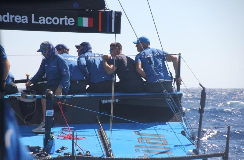 Cesare Barabino, an athlete from the Young Azzurra programme, on board Alkedo photo copyright Gigi Punzo taken at Yacht Club Costa Smeralda and featuring the TP52 class