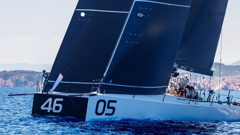 Alpha+ (bow number 46) and Sled (bow number 05) duelling on the race course, Rolex TP52 World Championship photo copyright Nico Martinez / 52 Super Series taken at Yacht Club Costa Smeralda and featuring the TP52 class