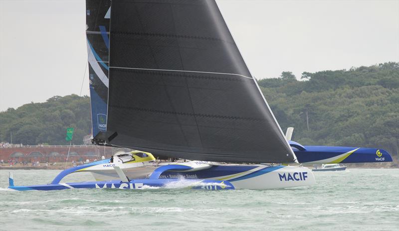 Macif passes Hurst Castle in the 2019 Rolex Fastnet Race photo copyright Mark Jardine taken at Royal Ocean Racing Club and featuring the Trimaran class