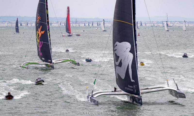 Four massive 32m long Ultim trimarans led the charge in the 2019 Rolex Fastnet Race photo copyright Rolex / Carlo Borlenghi taken at Royal Ocean Racing Club and featuring the Trimaran class