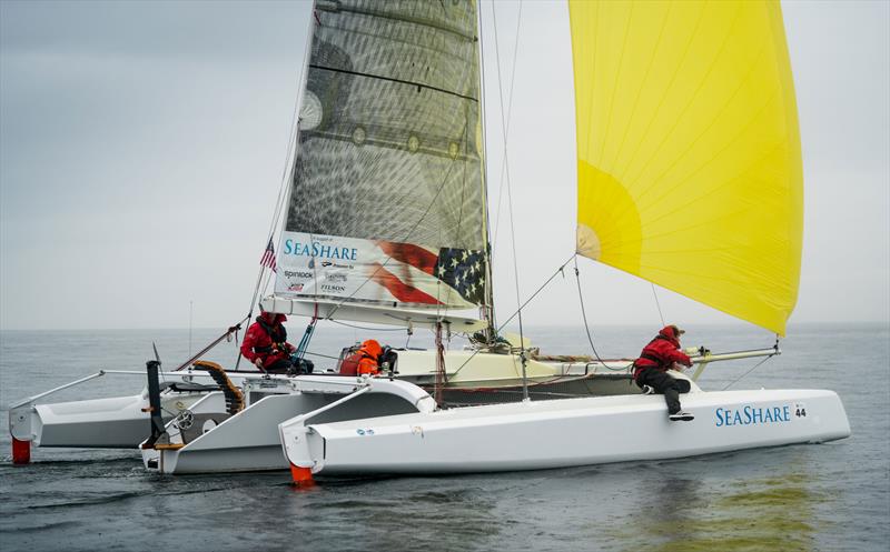 Team Pure and Wild/Freeburd coaxes their steed through some light airs en route to bagging $10,000 in purse money photo copyright Race to Alaska / Liv von Oelreich taken at  and featuring the Trimaran class
