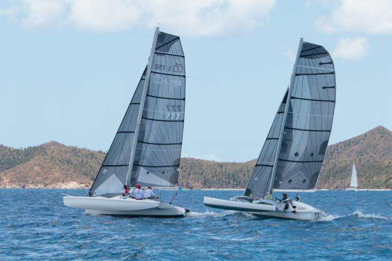 Close racing for Eddie Brockbank's Corsair Sprint 750 Lucky 7 (she survived Irma and Maria!) and Joseph San Martin's Newick Teegull trimaran, Piglet from St Croix - BVI Spring Regatta photo copyright Alastair Abrehart taken at Royal BVI Yacht Club and featuring the Trimaran class