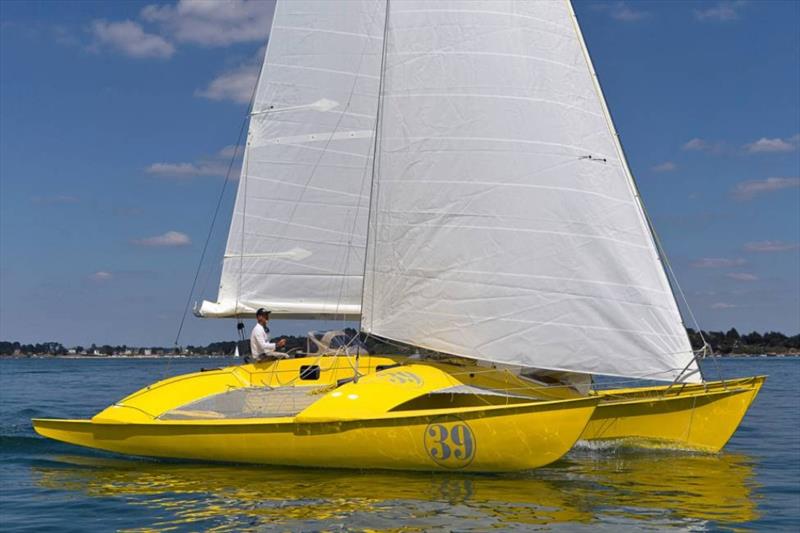 Loïck Peyron and `Happy` photo copyright Pierre de Champsavin taken at  and featuring the Trimaran class