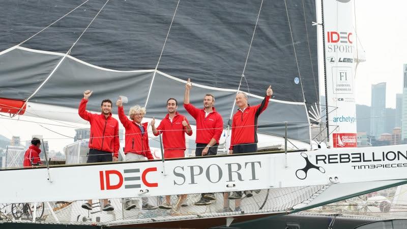 Skipper Francis Joyon and crew members Bertrand Delesne, Antoine Blouet, Corentin Joyon and Christophe Houdet take guests on board before it departs for London, during the IDEC Sport maxi trimaran Asian Tour Media day at he The Royal Yacht Club photo copyright Théodore Kaye / Aléa / IDEC SPORT taken at  and featuring the Trimaran class