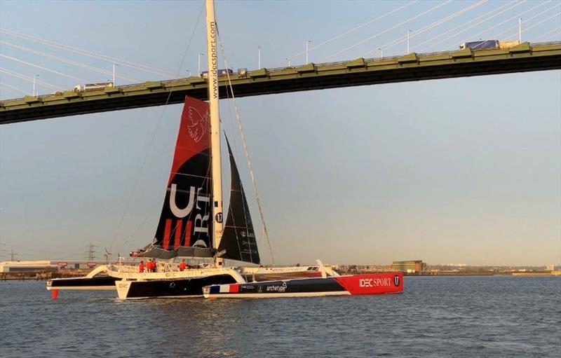 IDEC SPORT crosses the finish line photo copyright Paul Bessereau / IDEC SPORT taken at  and featuring the Trimaran class