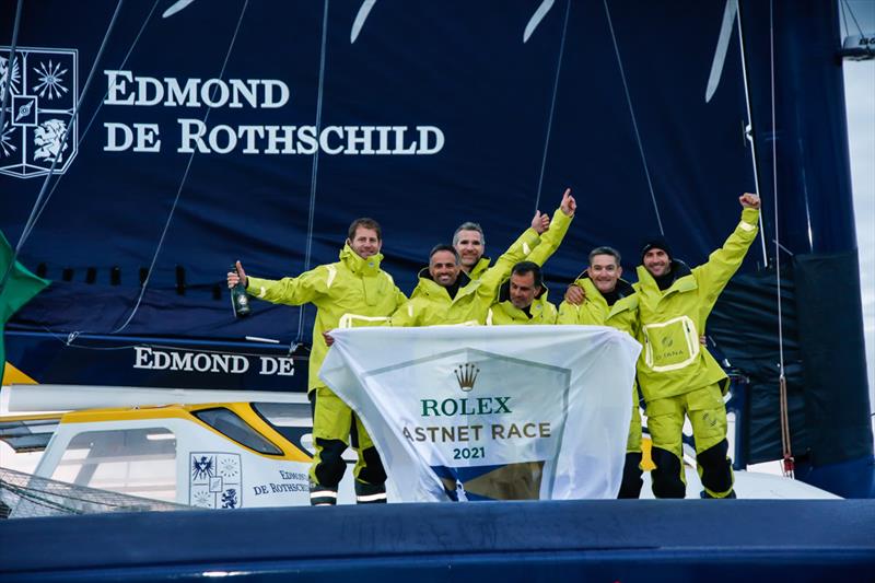 The Maxi Edmond de Rothschild crew celebrate their latest victory - Rolex Fastnet Race photo copyright Paul Wyeth / pwpictures.com taken at Royal Ocean Racing Club and featuring the Trimaran class