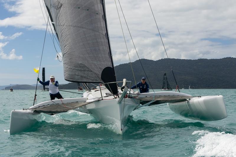 Full Bore crew having fun on the race course - 2023 Airlie Beach Race Week, Day 5 photo copyright Shirley Wodson / ABRW taken at Whitsunday Sailing Club and featuring the Trimaran class