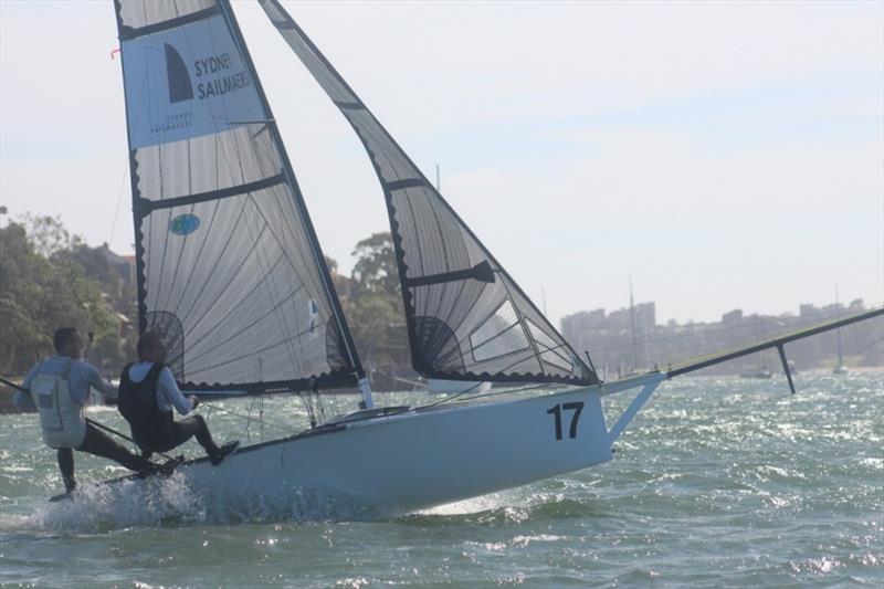 Press and Hay on fire aboard Sydney Sailmakers - 12ft Skiff NSW Championship photo copyright Vita Williams taken at Lane Cove 12ft Sailing Skiff Club and featuring the 12ft Skiff class