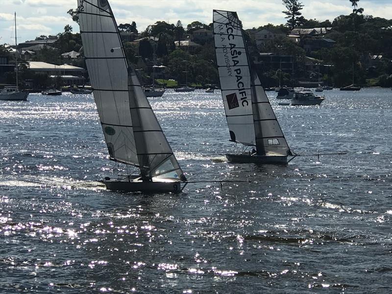 LCC plus T&C - 12ft Skiff Upper Harbour Championship photo copyright Brett Hobson taken at Lane Cove 12ft Sailing Skiff Club and featuring the 12ft Skiff class