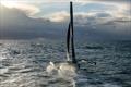Thomas Colville and crew on Sodebo Ultim 3 off Ouessant, win the Jules Verne Trophy, a non-stop crewed round-the-world race, in Brest on Sunday 25th 2026 