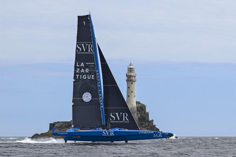 The Ultim trimaran SVR Lazartigue was the first yacht to round the Fastnet Rock in the Rolex Fastnet Race 2025 - photo © Rolex / Kurt Arrigo
