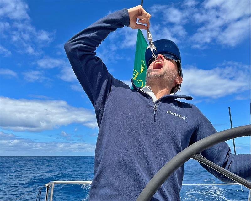 A man with 316 intestines - Jack Macartney and a raw squid - photo © Jack Macartney