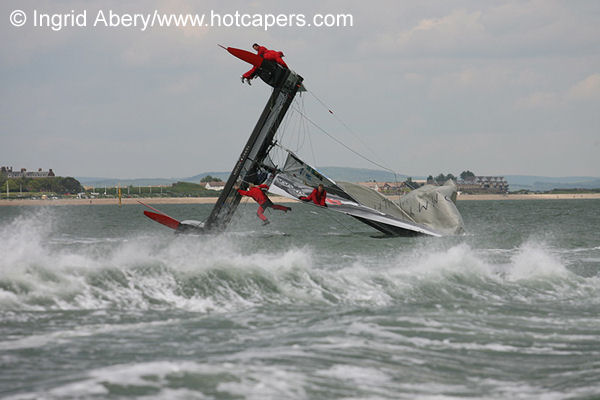 A spectacular capsize for Tommy Hilfiger during the Portsmouth VX40 Grand Prix photo copyright Ingrid Abery / www.hotcapers.com taken at  and featuring the  class