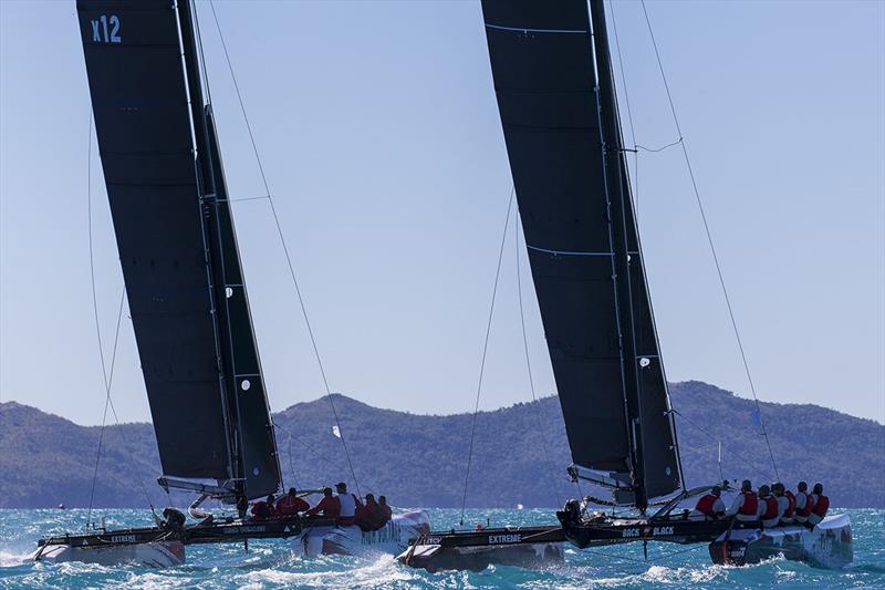 Extreme 40's Back in Black and High Voltage - Airlie Beach Race Week photo copyright Andrea Francolini taken at Whitsunday Sailing Club and featuring the Extreme 40 class