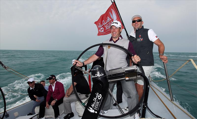 World no.1 golfer Lee Westwood helming a Volvo 70 with Ian Walker in Abu Dhabi photo copyright Scott Halleran taken at  and featuring the Volvo 70 class
