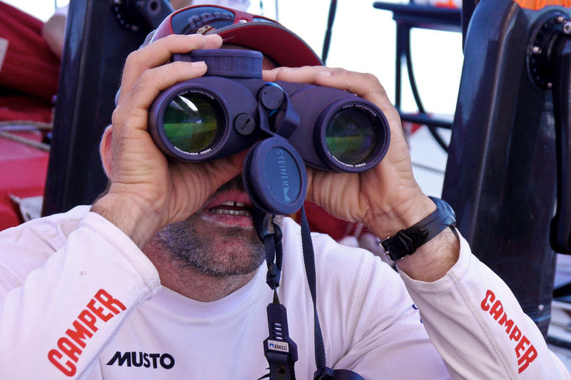 Stu Bannatyne using the binoculars to check on the sails of Puma ahead from onboard CAMPER during leg 6 of the Volvo Ocean Race photo copyright Hamish Hooper / CAMPER ETNZ / Volvo Ocean Race taken at  and featuring the Volvo 70 class