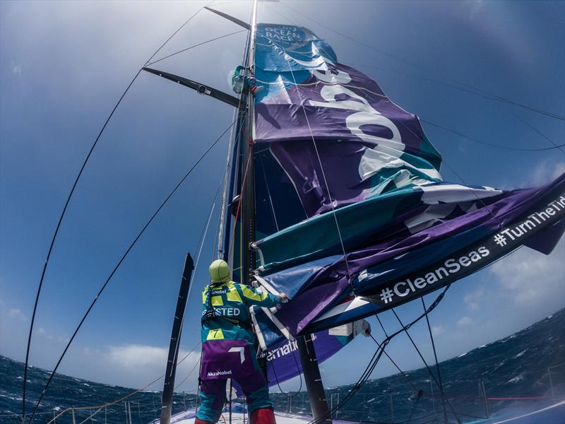 AkzoNobel crew climb the damaged mast after suffering a sail track issue - now under repair 14 December, 2017 - photo © James Blake / Volvo Ocean Race