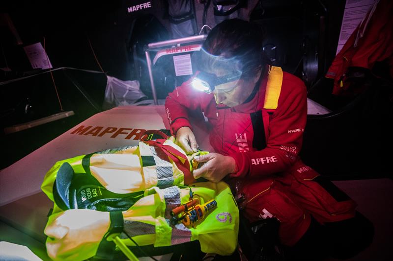 Repacking three lifejackets which inflated in a big wet, MAPFRE - Day 7, Leg 3, Volvo Ocean Race photo copyright Jen Edney / Volvo Ocean Race taken at  and featuring the Volvo One-Design class