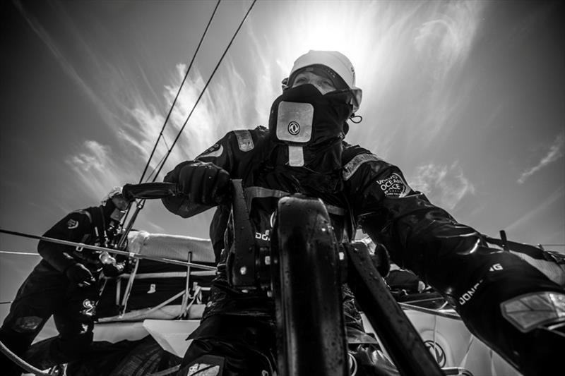 Leg 3, Cape Town to Melbourne, day 10, on board Dongfeng. Back Light on Marie Riou grinding the main sheet - photo © Martin Keruzore / Volvo Ocean Race
