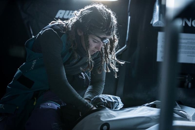 Leg 3, Cape Town to Melbourne, day 12, on board AkzoNobel. Martine Grael searching for that new change of thermals. They can life your day photo copyright James Blake / Volvo Ocean Race taken at  and featuring the Volvo One-Design class