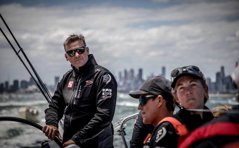 Leg 4, Melbourne to Hong Kong, day 1 Melbourne skyline behind as the team head out of the bay on board Sun Hung Kai / Scallywag photo copyright Konrad Frost / Volvo Ocean Race taken at Royal Melbourne Yacht Squadron and featuring the Volvo One-Design class