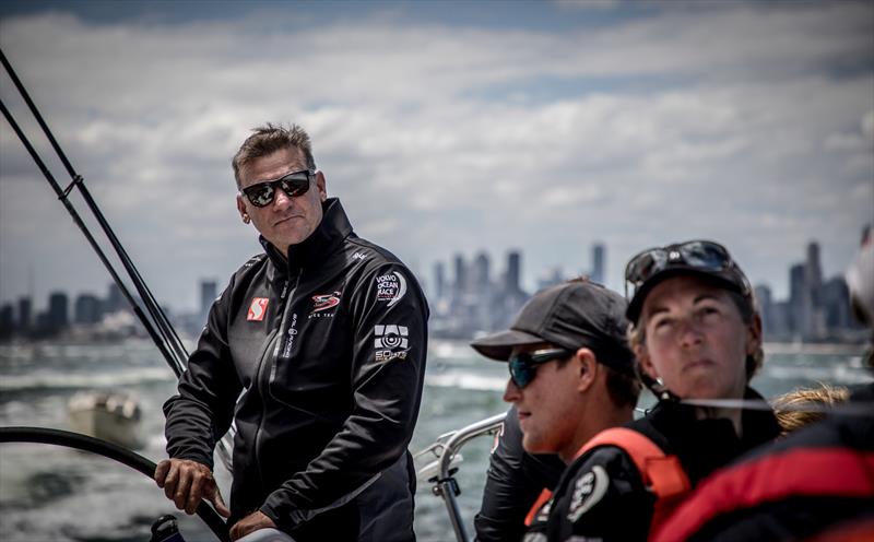 Leg 4, Melbourne to Hong Kong, day 1 Melbourne skyline behind as the team head out of the bay on board Sun Hung Kai / Scallywag. - photo © Konrad Frost / Volvo Ocean Race