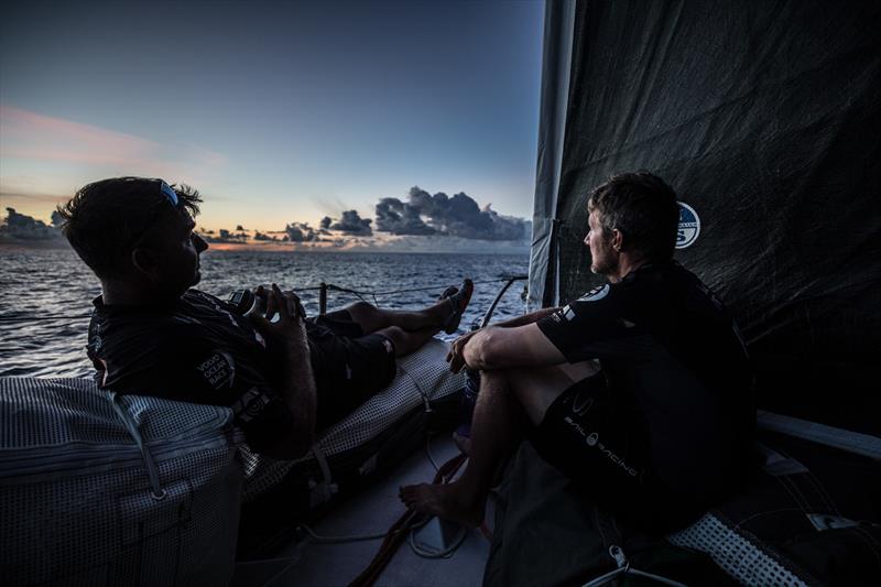 Leg 4, Melbourne to Hong Kong, Day 9 As the sun goes gown Team Brunel are on the horizon. As the sun sets the lights of almost all the fleet are around us on board Sun Hung Kai / Scallywag photo copyright Konrad Frost / Volvo Ocean Race taken at  and featuring the Volvo One-Design class