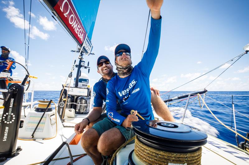 Leg 4, Melbourne to Hong Kong, day 10, Phil Harmer passes on some two-time-race-winner trimming expertise to good friend and bowman on board Vestas 11th Hour, Nick Dana photo copyright Amory Ross / Volvo Ocean Race taken at  and featuring the Volvo One-Design class