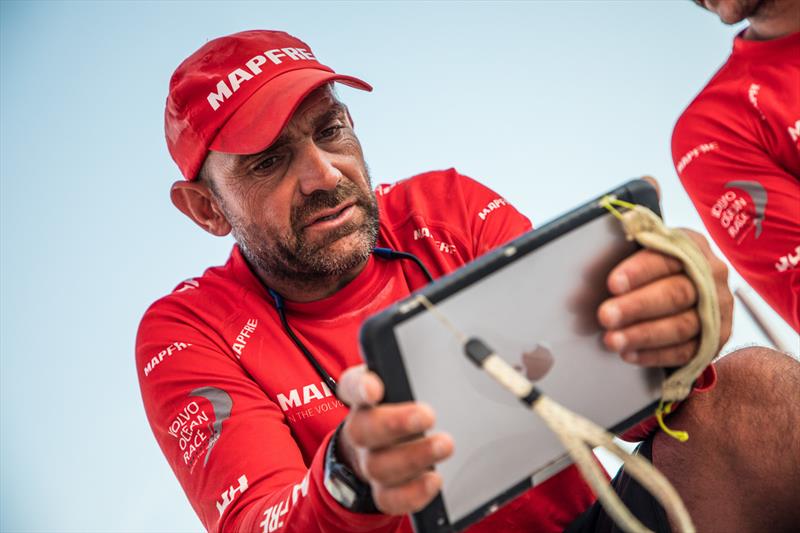 Leg 4, Melbourne to Hong Kong, day 10 on board MAPFRE, Xabi Fernandez with the ipad comenting the last sched with the crew on deck photo copyright Ugo Fonolla / Volvo Ocean Race taken at  and featuring the Volvo One-Design class