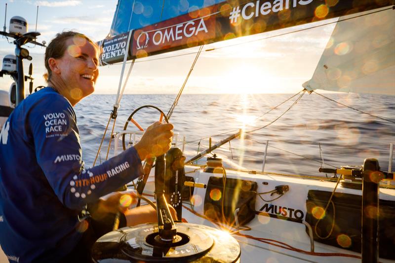 Leg 4, Melbourne to Hong Kong, day 10, Stacey Jackson enjoying a much cooler, much faster, sunset watch trimming the mainsail on board Vestas 11th Hour photo copyright Amory Ross / Volvo Ocean Race taken at  and featuring the Volvo One-Design class