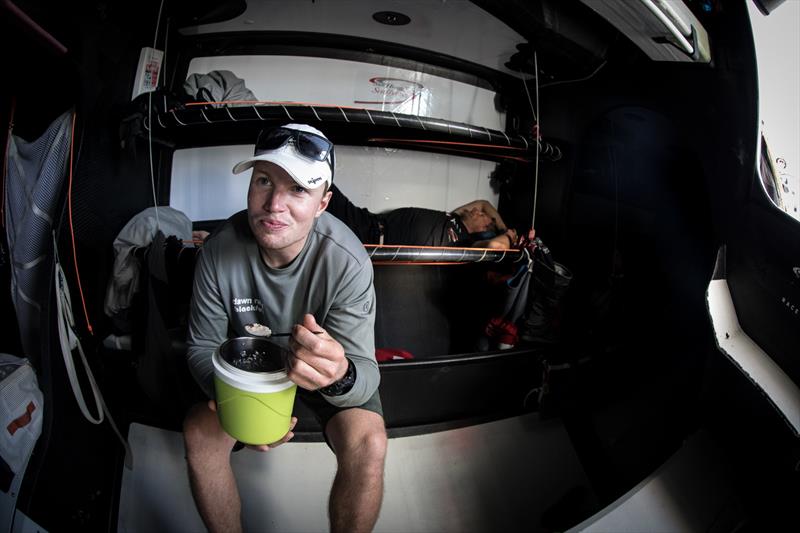 Leg 4, Melbourne to Hong Kong, day 11 Trystan Seal having breakfast on board Sun Hung Kai / Scallywag photo copyright Konrad Frost / Volvo Ocean Race taken at  and featuring the Volvo One-Design class