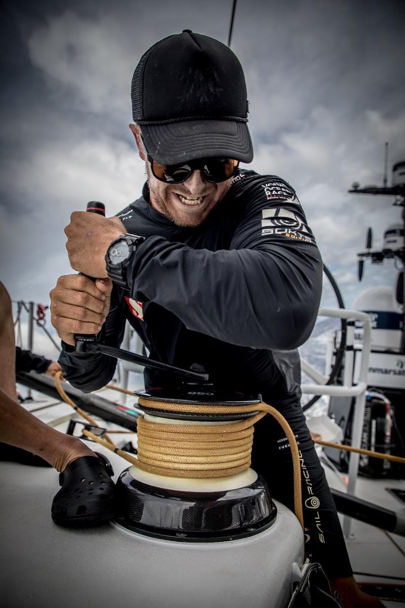 Volvo Ocean Race Leg 4, Melbourne to Hong Kong, day 12 Ben Piggott on the runner winch on board Sun Hung Kai / Scallywag photo copyright Konrad Frost / Volvo Ocean Race taken at  and featuring the Volvo One-Design class