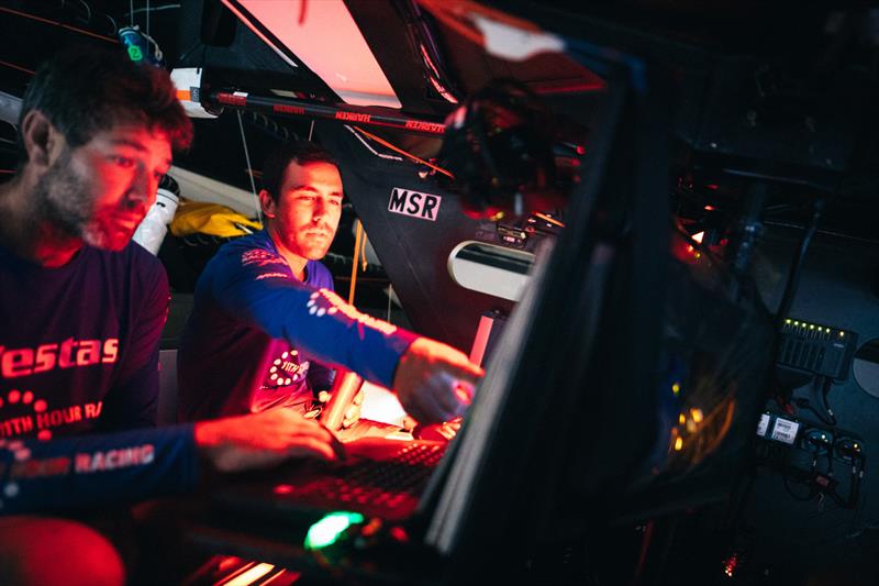 Leg 4, Melbourne to Hong Kong, day 12, Mark Towill and Simon Fisher `SiFi` dissecting the latest position reportt from the nav station on board Vestas 11th Hour photo copyright Amory Ross / Volvo Ocean Race taken at  and featuring the Volvo One-Design class