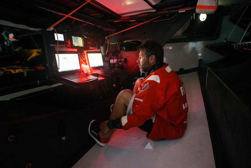 Leg 4, Melbourne to Hong Kong, day 13, Simon Fisher \`SiFi\` sits in the bilge after swinging his nav station on board Vestas 11th Hour to the high side for a quick gybe to clear an atoll. - photo © Amory Ross / Volvo Ocean Race