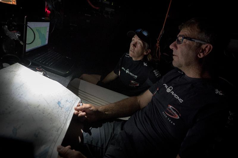 Leg 4, Melbourne to Hong Kong, day 5 Libby Greenhalgh and David Witt checking the navigation on board Sun Hung Kai / Scallywag. - photo © Konrad Frost / Volvo Ocean Race