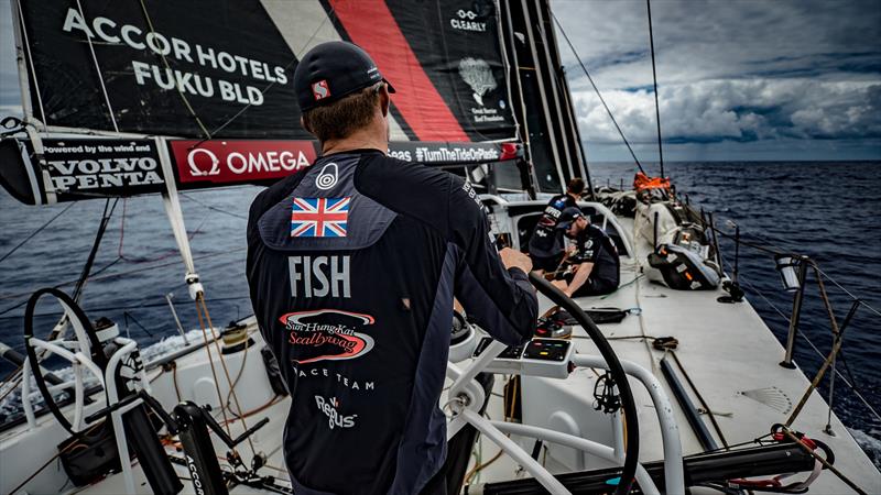 Leg 6 to Auckland, day 12 on board Sun hung Kai / Scallywag. John Fisher helming his way through the clouds. 18 February, . - photo © Jeremie Lecaudey / Volvo Ocean Race