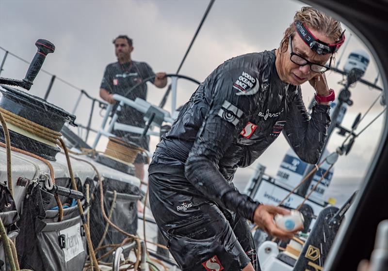 Leg 6 to Auckland, day 14 on board Sun hung Kai / Scallywag. Annemieke Bes taking advantage of a sudden rain shower to clean up. 20 February, . - photo © Jeremie Lecaudey / Volvo Ocean Race