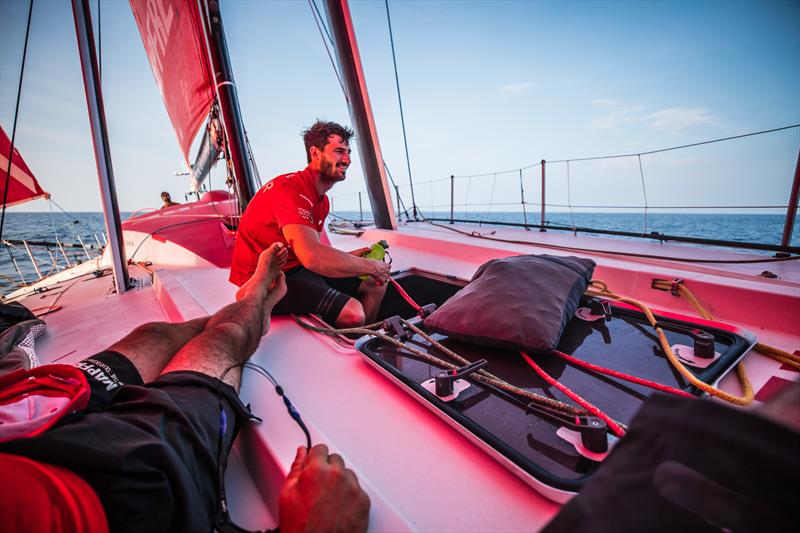 Leg 6 to Auckland, day 16 on board MAPFRE, Louis Sinclair going out of the hatch with his pillow because inside is too hot to sleep. 22 February,  photo copyright Ugo Fonolla / Volvo Ocean Race taken at  and featuring the Volvo One-Design class